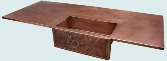 Handcrafted-Copper-Countertops-Repousse Apron on Farm Sink